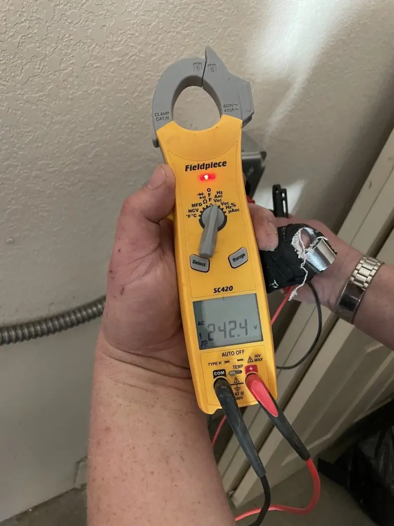 Voltage testing with clamp meter during Generator Installation in Venice